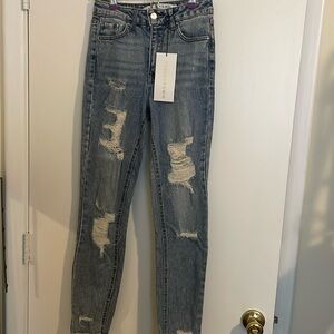 High waisted distressed jeans. Size 1! NWT